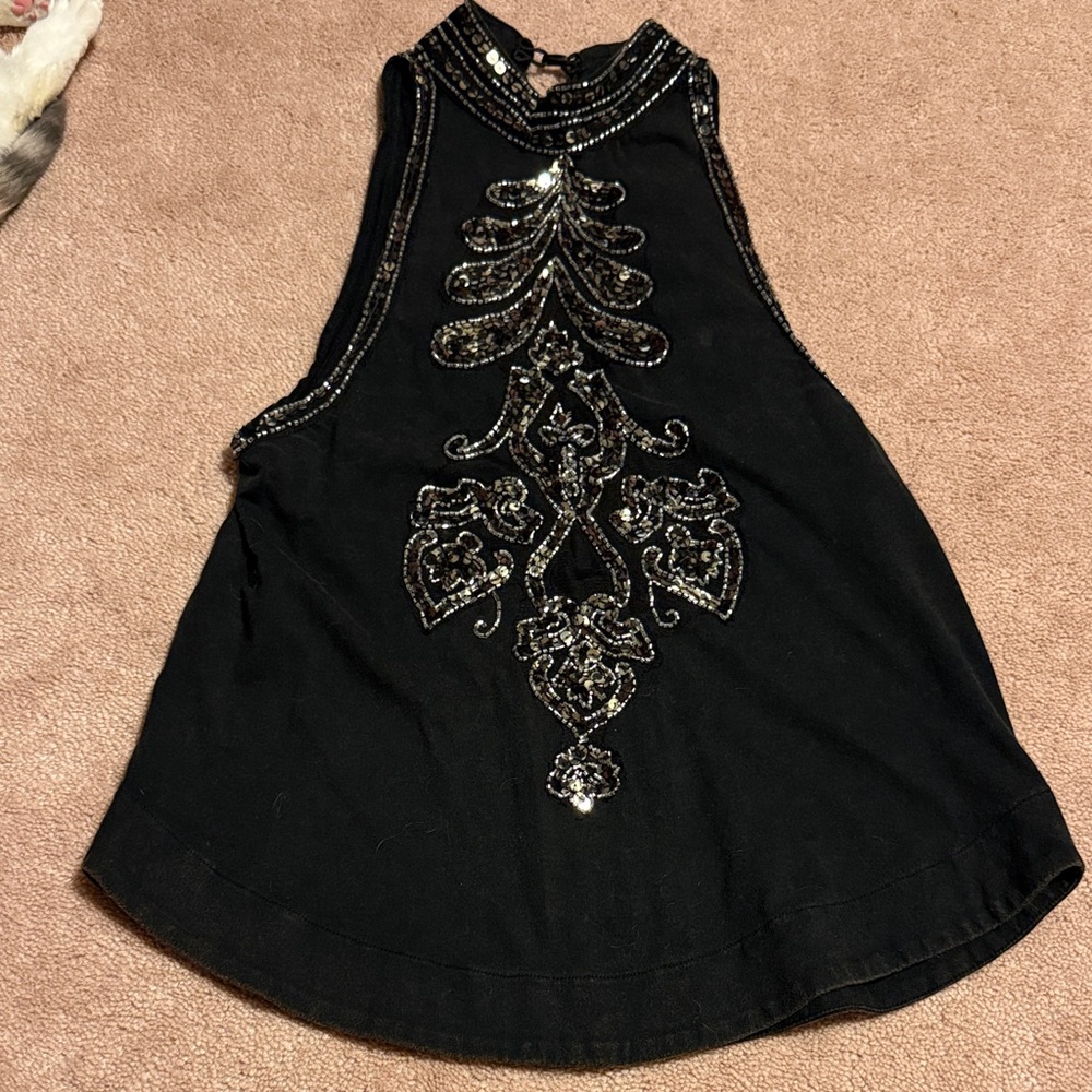 Black Sleeveless Top with Silver Embellishments